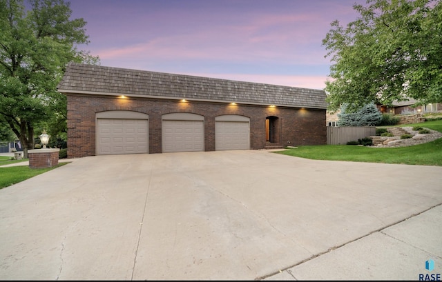 view of front of property with a garage