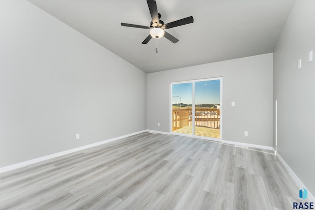 spare room featuring ceiling fan and light wood-type flooring