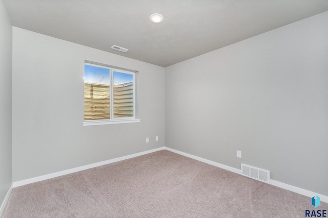 view of carpeted spare room