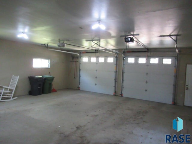 garage featuring a garage door opener