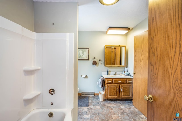 full bathroom featuring tile patterned flooring, toilet, shower / tub combination, and vanity