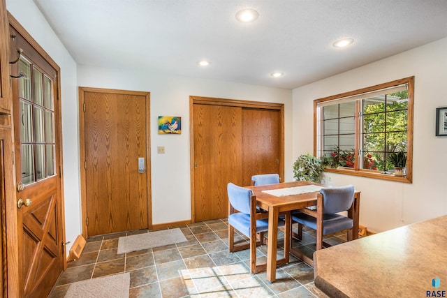 dining room featuring tile patterned flooring