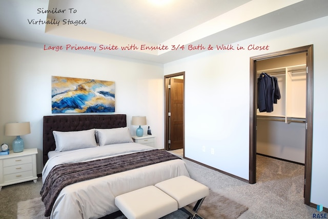 carpeted bedroom featuring a walk in closet and a closet