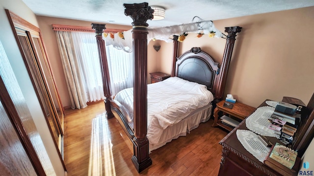 bedroom featuring hardwood / wood-style flooring