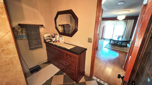 bathroom featuring a textured ceiling