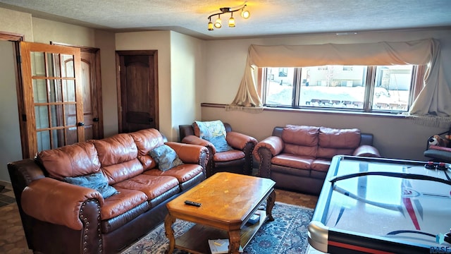 living room featuring a textured ceiling