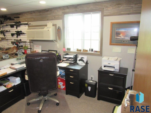 carpeted office space featuring a wall mounted AC