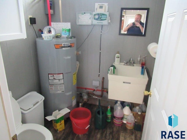 utilities with sink and water heater