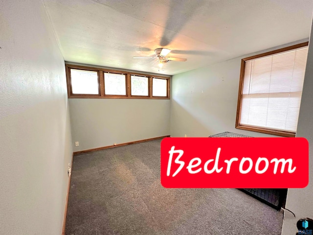 unfurnished bedroom featuring carpet flooring and ceiling fan