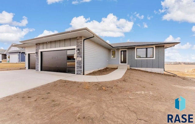 ranch-style house with a garage