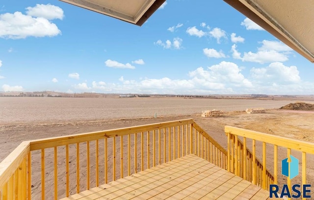 deck featuring a rural view