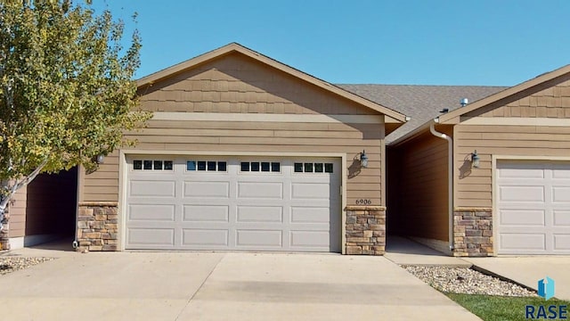 ranch-style home with a garage