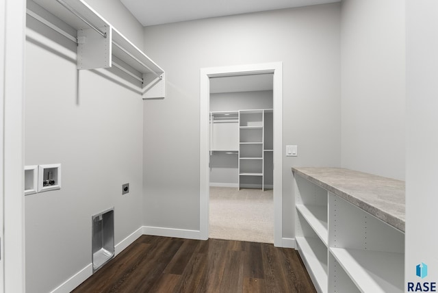 washroom featuring laundry area, baseboards, dark wood-style flooring, washer hookup, and electric dryer hookup