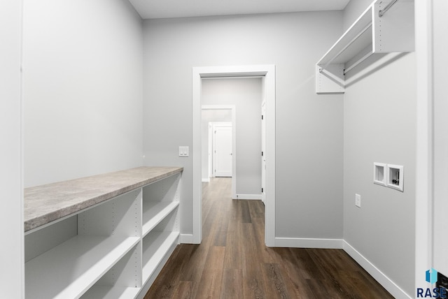 clothes washing area with laundry area, baseboards, hookup for a washing machine, and dark wood-style floors