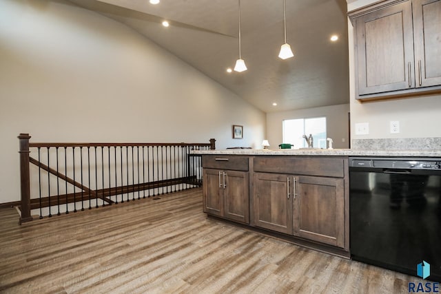 kitchen featuring lofted ceiling, dark brown cabinetry, light hardwood / wood-style flooring, dishwasher, and pendant lighting