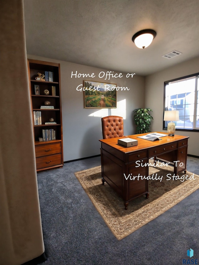 office featuring built in features, visible vents, and dark carpet