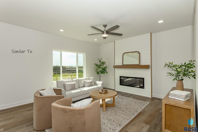 6513 S Barclay Trl, Sioux Falls, SD 57106 - living room featuring ceiling fan, baseboards, wood finished floors, a fireplace, and recessed lighting
