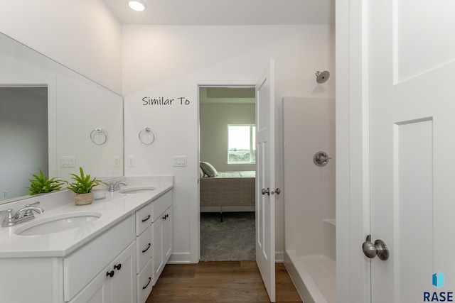 6513 S Barclay Trl, Sioux Falls, SD 57106 - full bath with wood finished floors, ensuite bathroom, and double vanity
