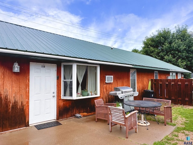 rear view of house with a patio