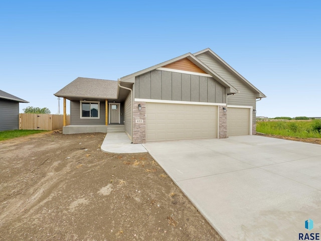 view of front of property with a garage