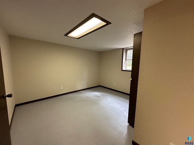 interior space with a textured ceiling