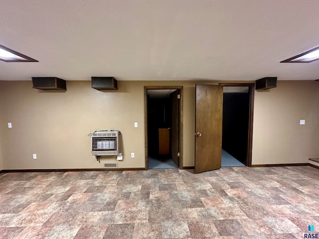 basement featuring heating unit