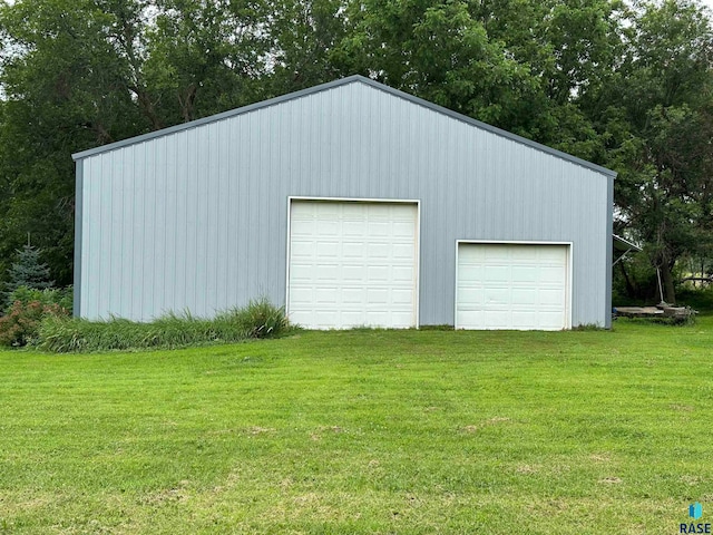 garage with a yard