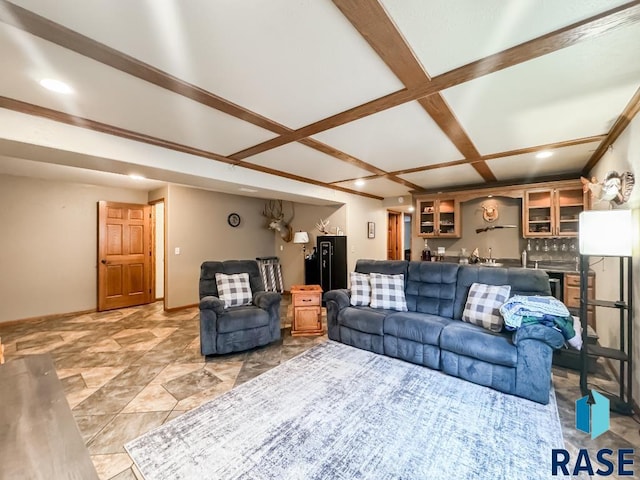 tiled living room with coffered ceiling and beamed ceiling