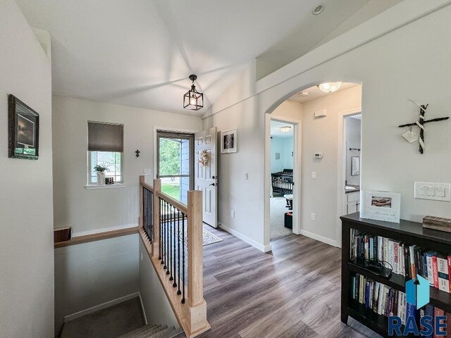 hallway featuring wood-type flooring