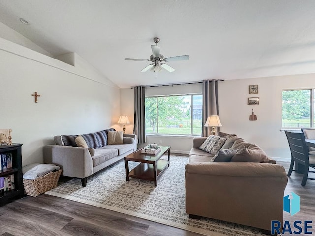 living room with hardwood / wood-style flooring, plenty of natural light, lofted ceiling, and ceiling fan