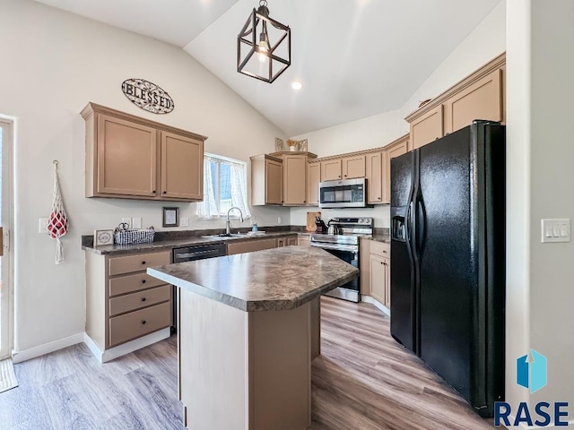 kitchen with lofted ceiling, sink, a center island, pendant lighting, and black appliances