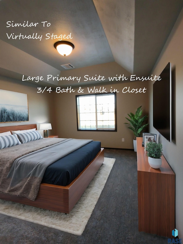 bedroom featuring visible vents, vaulted ceiling, and dark colored carpet