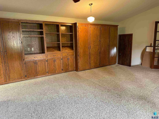 interior space featuring light colored carpet