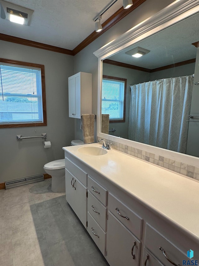 bathroom featuring rail lighting, a baseboard heating unit, vanity, tile patterned floors, and toilet