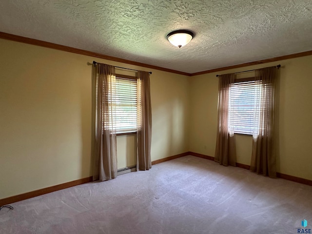 empty room with a baseboard radiator, crown molding, a textured ceiling, and carpet flooring