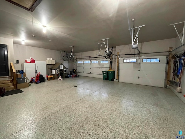 garage with white refrigerator