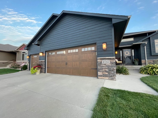 view of property exterior with a garage