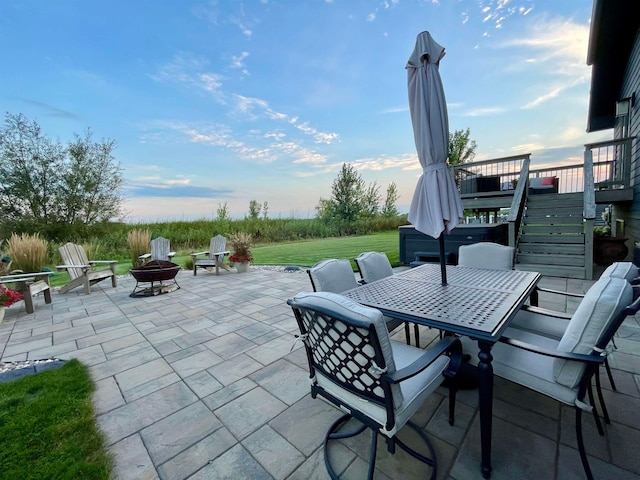 view of patio / terrace with an outdoor fire pit