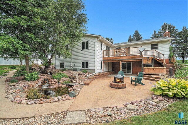 ranch-style home featuring a lawn, a garage, and covered porch