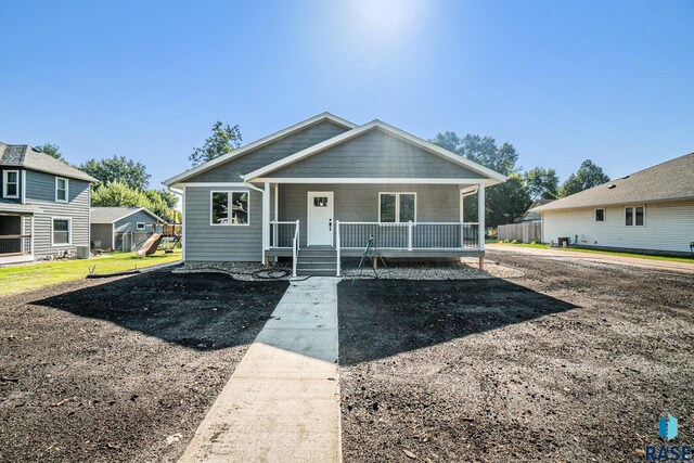 bungalow-style home with a porch