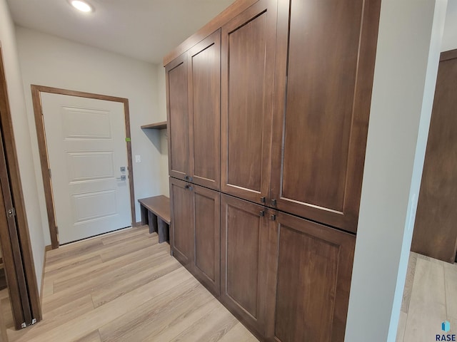 mudroom featuring light wood finished floors