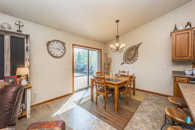 dining room featuring an inviting chandelier