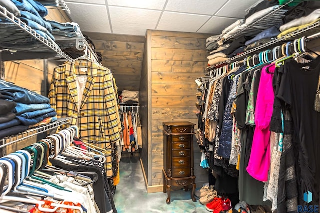 spacious closet featuring a paneled ceiling