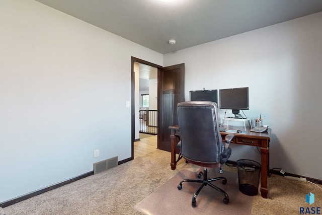 office area with light carpet