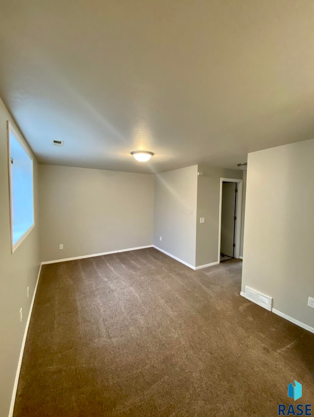 view of carpeted spare room