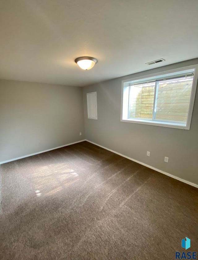 view of carpeted spare room