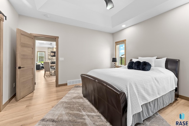 bedroom featuring light hardwood / wood-style flooring