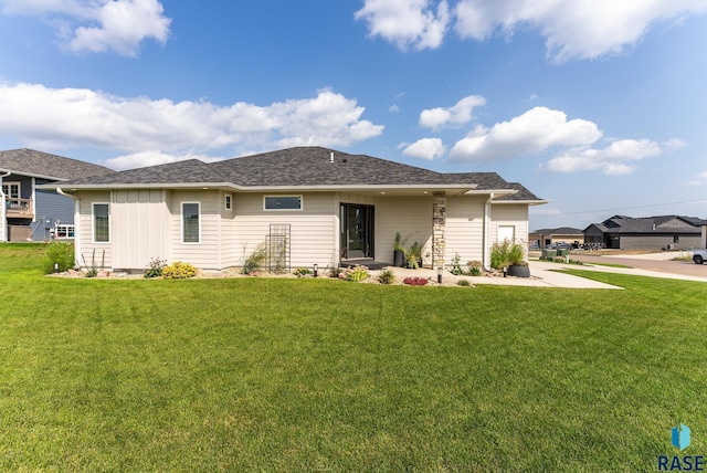 exterior space with a front lawn