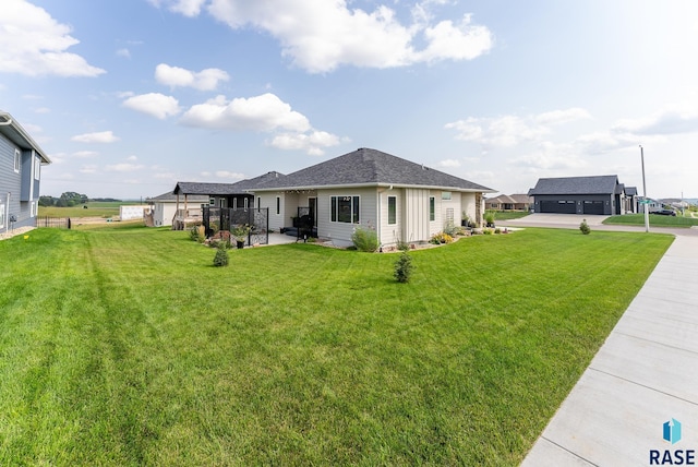 exterior space with a garage and a front yard