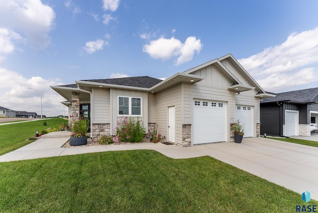 view of front of house with a front lawn and a garage